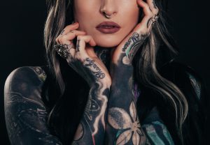 woman with tattoos on her arms